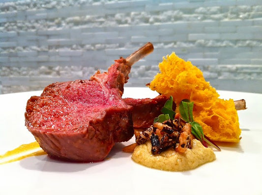 Lamb Rack with harissa, brioche, and puffed wild rice!  